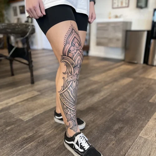 Polynesian hip and thigh tattoo with floral motifs - By Kiwi Burt 18b Tattoo