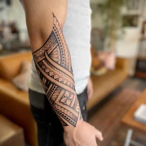 Custom blackwork forearm tattoo of Polynesian geometric symmetry - By Kiwi Burt 18b Tattoo