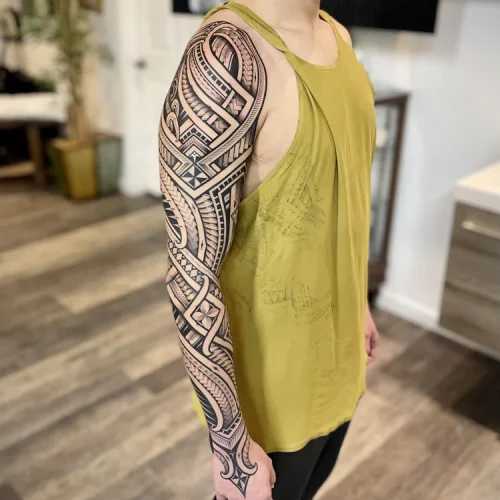 Polynesian full-sleeve tattoo on a shoulder Las Vegas | Las Vegas Arts District
