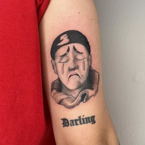 Realistic Crying clown face tattoo in black and grey - By Marcos Ta 18b Tattoo