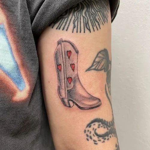 Black and grey boot tattoo with small red heart - By Marcos Ta 18b Tattoo