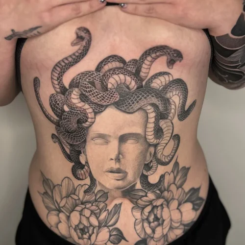 Illustrative stomach tattoo of Medusa - By Mike Ta 18b Tattoo