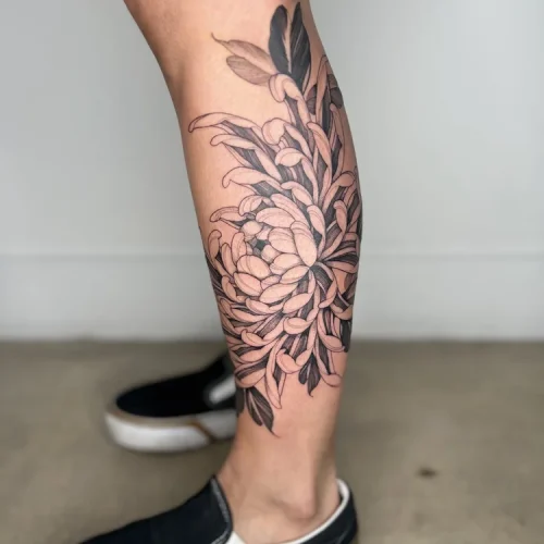 illustrative chrysanthemum tattoo on the lower leg | Downtown Las Vegas