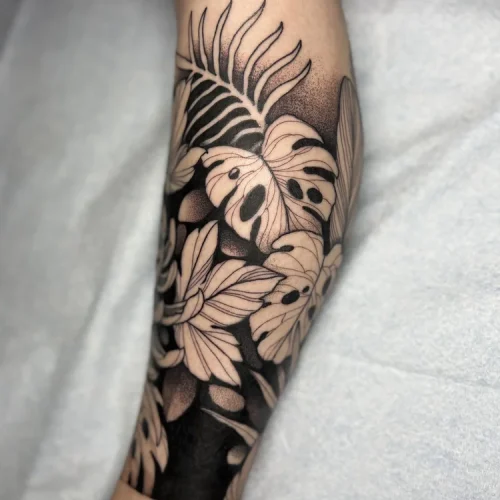 Black and grey illustrative forearm tattoo | Las Vegas Arts District