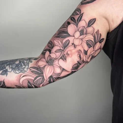 Illustrative tattoo sleeve of woman’s face | Las Vegas Arts District