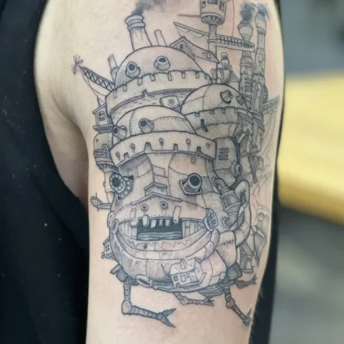 Fine-line black and grey tattoo of Howl's Moving Castle - By Tyson 18b Tattoo