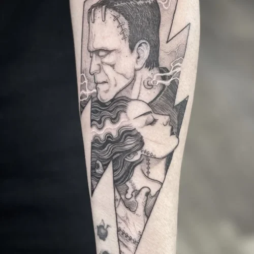 Fine-line black and grey tattoo of a Phase I Star Wars Clone Trooper
