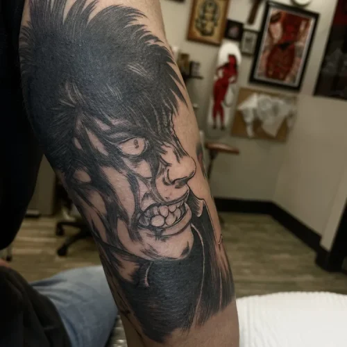 Illustrative black and grey Pierrot clown profile tattoo | Las Vegas Arts District