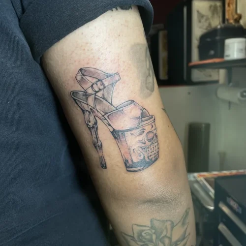 black and grey high-heel shoe tattoo Las Vegas - By Baby G 18b Tattoo